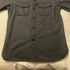 Size small Grey men’s wool jacket.  Excellent condition. Hardly worn